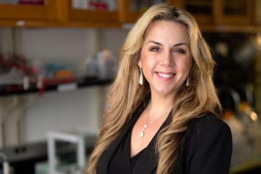 Dr. Tanya Stoyanova smiles in a UCLA lab.