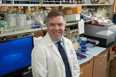 Photograph of John Chute, MD in the lab