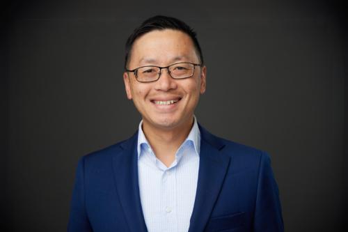 UCLA researcher Jason Chiang smiles for a headshot.