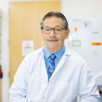 Don Kohn smiles in a UCLA lab. 